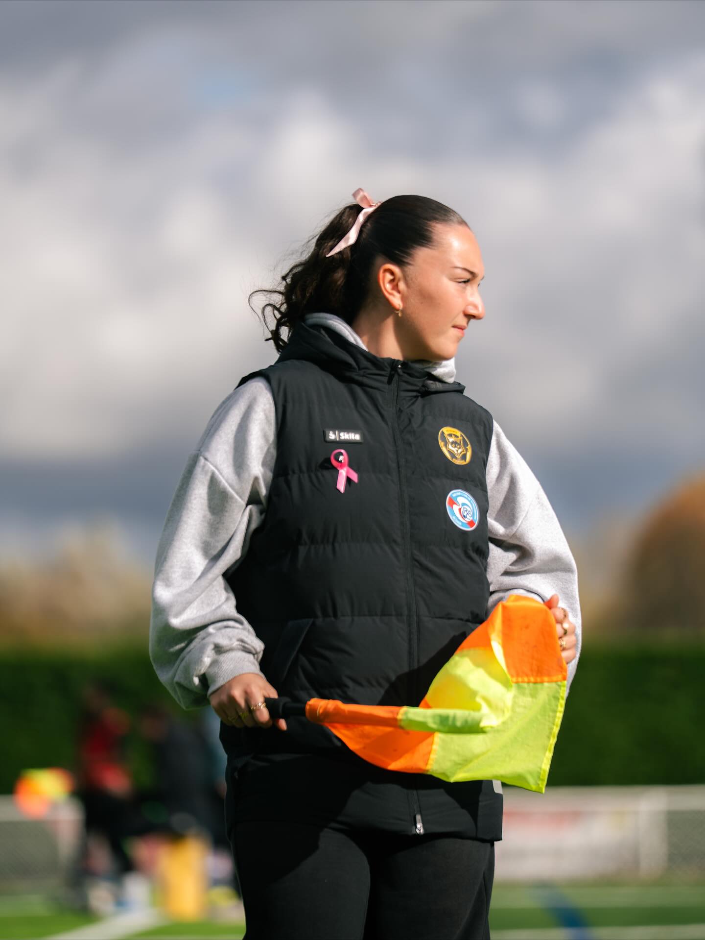 Arbitre portant le ruban rose